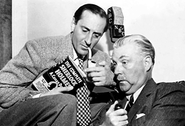 Basil Rathbone and Nigel Bruce at the microphone